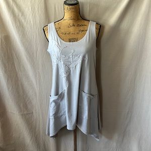 Tunic tank top with butterfly detailing